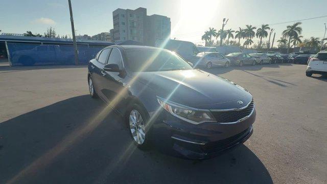 2017 Horizon Blue /Black Kia Optima (5XXGT4L39HG) with an 4 2.4 L engine, Automatic transmission, located at 27610 S Dixie Hwy, Homestead, FL, 33032, (305) 749-2348, 25.510241, -80.438301 - IIHS Top Safety Pick. Scores 36 Highway MPG and 25 City MPG! This Kia Optima boasts a Regular Unleaded I-4 2.4 L/144 engine powering this Automatic transmission. WHEELS: 17 ALLOY -inc: Tires: 17 (Fleet), HORIZON BLUE, CARPETED FLOOR MATS.* This Kia Optima Features the Following Options *BLACK, CLOTH - Photo#5