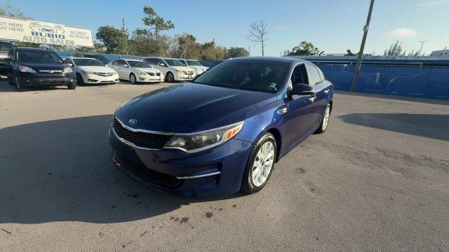 2017 Horizon Blue /Black Kia Optima (5XXGT4L39HG) with an 4 2.4 L engine, Automatic transmission, located at 27610 S Dixie Hwy, Homestead, FL, 33032, (305) 749-2348, 25.510241, -80.438301 - IIHS Top Safety Pick. Scores 36 Highway MPG and 25 City MPG! This Kia Optima boasts a Regular Unleaded I-4 2.4 L/144 engine powering this Automatic transmission. WHEELS: 17 ALLOY -inc: Tires: 17 (Fleet), HORIZON BLUE, CARPETED FLOOR MATS.* This Kia Optima Features the Following Options *BLACK, CLOTH - Photo#7