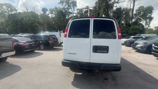 2020 Summit White /Medium Pewter Chevrolet Express Cargo Van (1GCWGAFG5L1) with an 8 6.0L engine, Automatic transmission, located at 27610 S Dixie Hwy, Homestead, FL, 33032, (305) 749-2348, 25.510241, -80.438301 - This Chevrolet Express Cargo Van delivers a Gas/Ethanol V8 6.0L/364 engine powering this Automatic transmission. WINDOW SECURITY BAR, REAR SIDE DOOR GLASS, VISORS, DRIVER AND FRONT PASSENGER, VINYL, TRANSMISSION, 6-SPEED AUTOMATIC, HEAVY-DUTY, ELECTRONICALLY CONTROLLED with overdrive and tow/haul mo - Photo#3