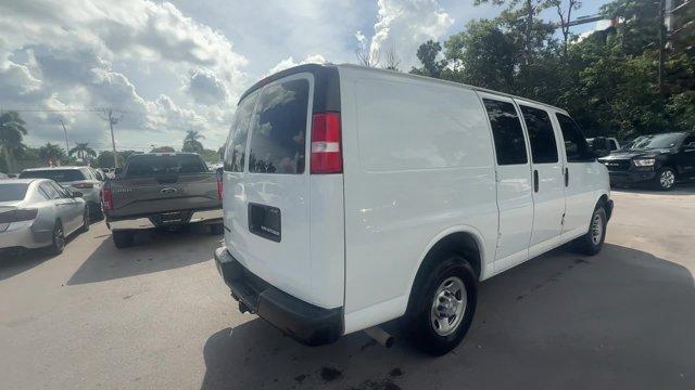 2020 Summit White /Medium Pewter Chevrolet Express Cargo Van (1GCWGAFG5L1) with an 8 6.0L engine, Automatic transmission, located at 27610 S Dixie Hwy, Homestead, FL, 33032, (305) 749-2348, 25.510241, -80.438301 - This Chevrolet Express Cargo Van delivers a Gas/Ethanol V8 6.0L/364 engine powering this Automatic transmission. WINDOW SECURITY BAR, REAR SIDE DOOR GLASS, VISORS, DRIVER AND FRONT PASSENGER, VINYL, TRANSMISSION, 6-SPEED AUTOMATIC, HEAVY-DUTY, ELECTRONICALLY CONTROLLED with overdrive and tow/haul mo - Photo#4