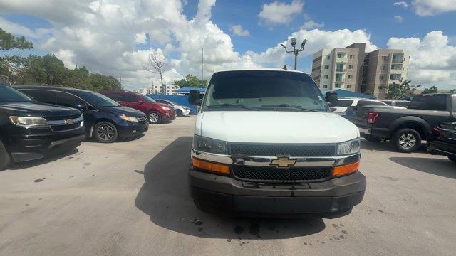 2020 Summit White /Medium Pewter Chevrolet Express Cargo Van (1GCWGAFG5L1) with an 8 6.0L engine, Automatic transmission, located at 27610 S Dixie Hwy, Homestead, FL, 33032, (305) 749-2348, 25.510241, -80.438301 - This Chevrolet Express Cargo Van delivers a Gas/Ethanol V8 6.0L/364 engine powering this Automatic transmission. WINDOW SECURITY BAR, REAR SIDE DOOR GLASS, VISORS, DRIVER AND FRONT PASSENGER, VINYL, TRANSMISSION, 6-SPEED AUTOMATIC, HEAVY-DUTY, ELECTRONICALLY CONTROLLED with overdrive and tow/haul mo - Photo#7