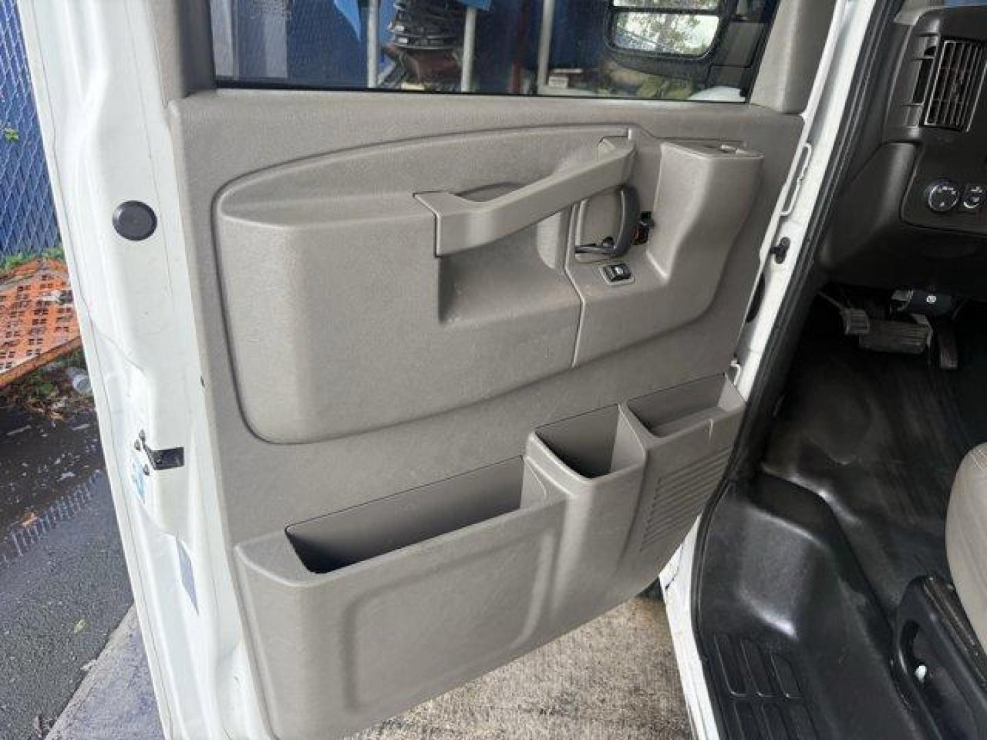 2020 Summit White /Medium Pewter Chevrolet Express Cargo Van (1GCWGAFG5L1) with an 8 6.0L engine, Automatic transmission, located at 27610 S Dixie Hwy, Homestead, FL, 33032, (305) 749-2348, 25.510241, -80.438301 - This Chevrolet Express Cargo Van delivers a Gas/Ethanol V8 6.0L/364 engine powering this Automatic transmission. WINDOW SECURITY BAR, REAR SIDE DOOR GLASS, VISORS, DRIVER AND FRONT PASSENGER, VINYL, TRANSMISSION, 6-SPEED AUTOMATIC, HEAVY-DUTY, ELECTRONICALLY CONTROLLED with overdrive and tow/haul mo - Photo#11