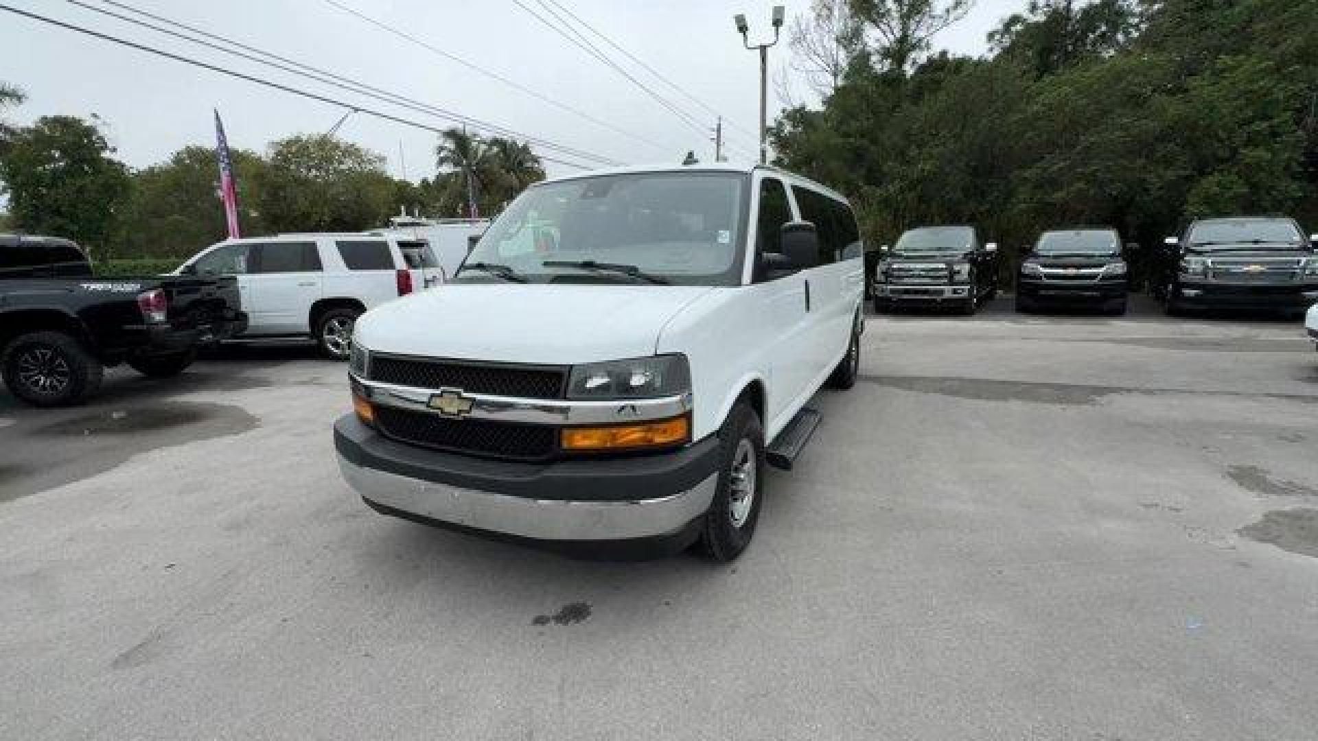 2019 Summit White /Medium Pewter Chevrolet Express Passenger (1GAZGPFP2K1) with an 6 4.3L engine, Automatic transmission, located at 27610 S Dixie Hwy, Homestead, FL, 33032, (305) 749-2348, 25.510241, -80.438301 - This Chevrolet Express Passenger delivers a Gas V6 4.3L/ engine powering this Automatic transmission. TRANSMISSION, 8-SPEED AUTOMATIC, ELECTRONICALLY CONTROLLED with overdrive and tow/haul mode. Includes Cruise Grade Braking and Powertrain Grade Braking (STD), SUMMIT WHITE, SHIP THRU, PRODUCED IN WE - Photo#0