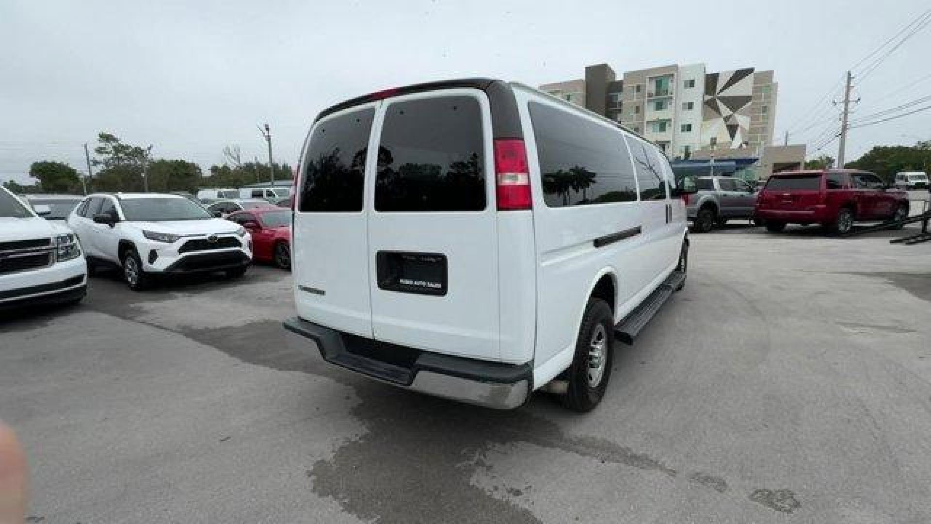 2019 Summit White /Medium Pewter Chevrolet Express Passenger (1GAZGPFP2K1) with an 6 4.3L engine, Automatic transmission, located at 27610 S Dixie Hwy, Homestead, FL, 33032, (305) 749-2348, 25.510241, -80.438301 - This Chevrolet Express Passenger delivers a Gas V6 4.3L/ engine powering this Automatic transmission. TRANSMISSION, 8-SPEED AUTOMATIC, ELECTRONICALLY CONTROLLED with overdrive and tow/haul mode. Includes Cruise Grade Braking and Powertrain Grade Braking (STD), SUMMIT WHITE, SHIP THRU, PRODUCED IN WE - Photo#4