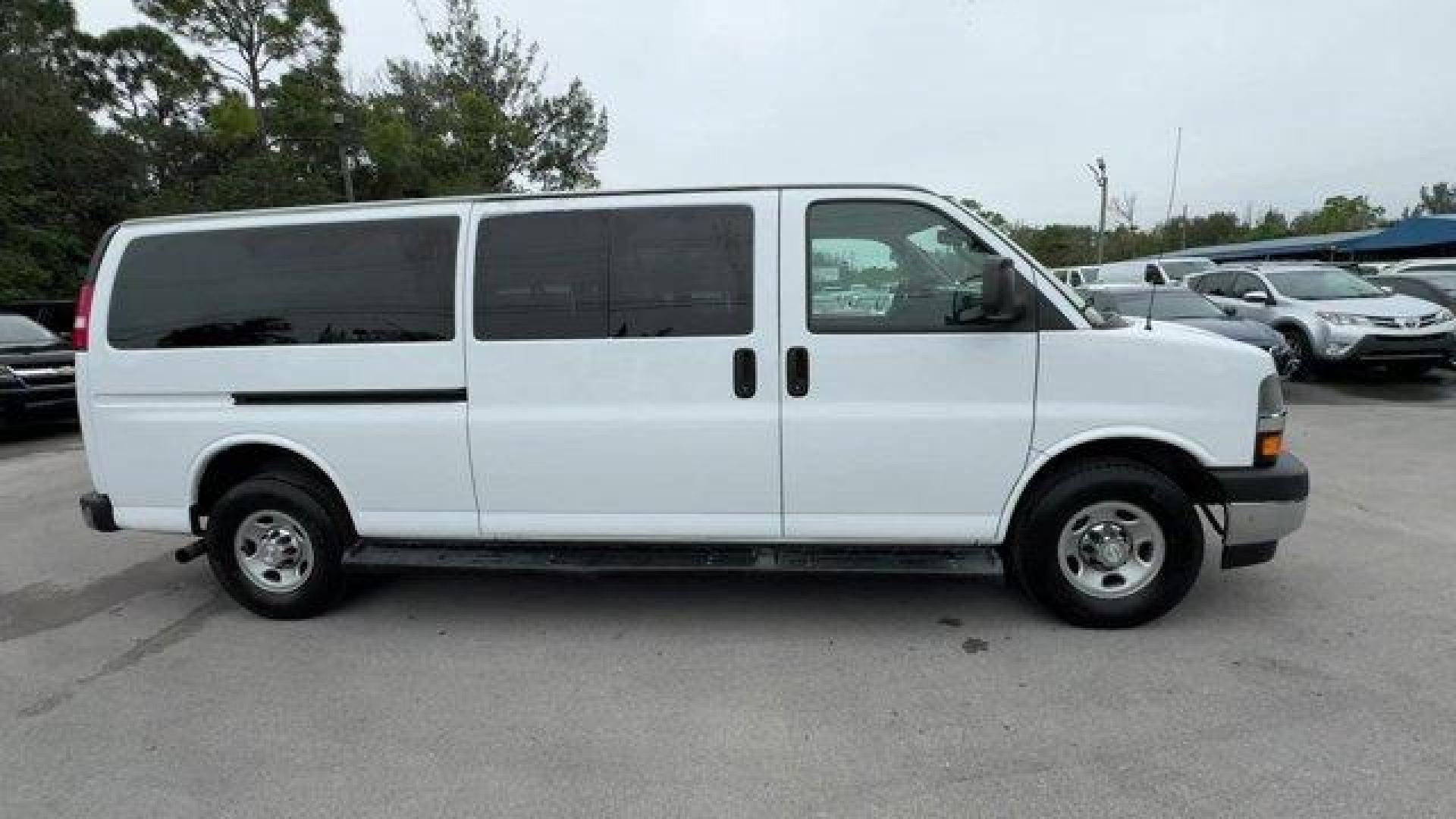 2019 Summit White /Medium Pewter Chevrolet Express Passenger (1GAZGPFP2K1) with an 6 4.3L engine, Automatic transmission, located at 27610 S Dixie Hwy, Homestead, FL, 33032, (305) 749-2348, 25.510241, -80.438301 - This Chevrolet Express Passenger delivers a Gas V6 4.3L/ engine powering this Automatic transmission. TRANSMISSION, 8-SPEED AUTOMATIC, ELECTRONICALLY CONTROLLED with overdrive and tow/haul mode. Includes Cruise Grade Braking and Powertrain Grade Braking (STD), SUMMIT WHITE, SHIP THRU, PRODUCED IN WE - Photo#5