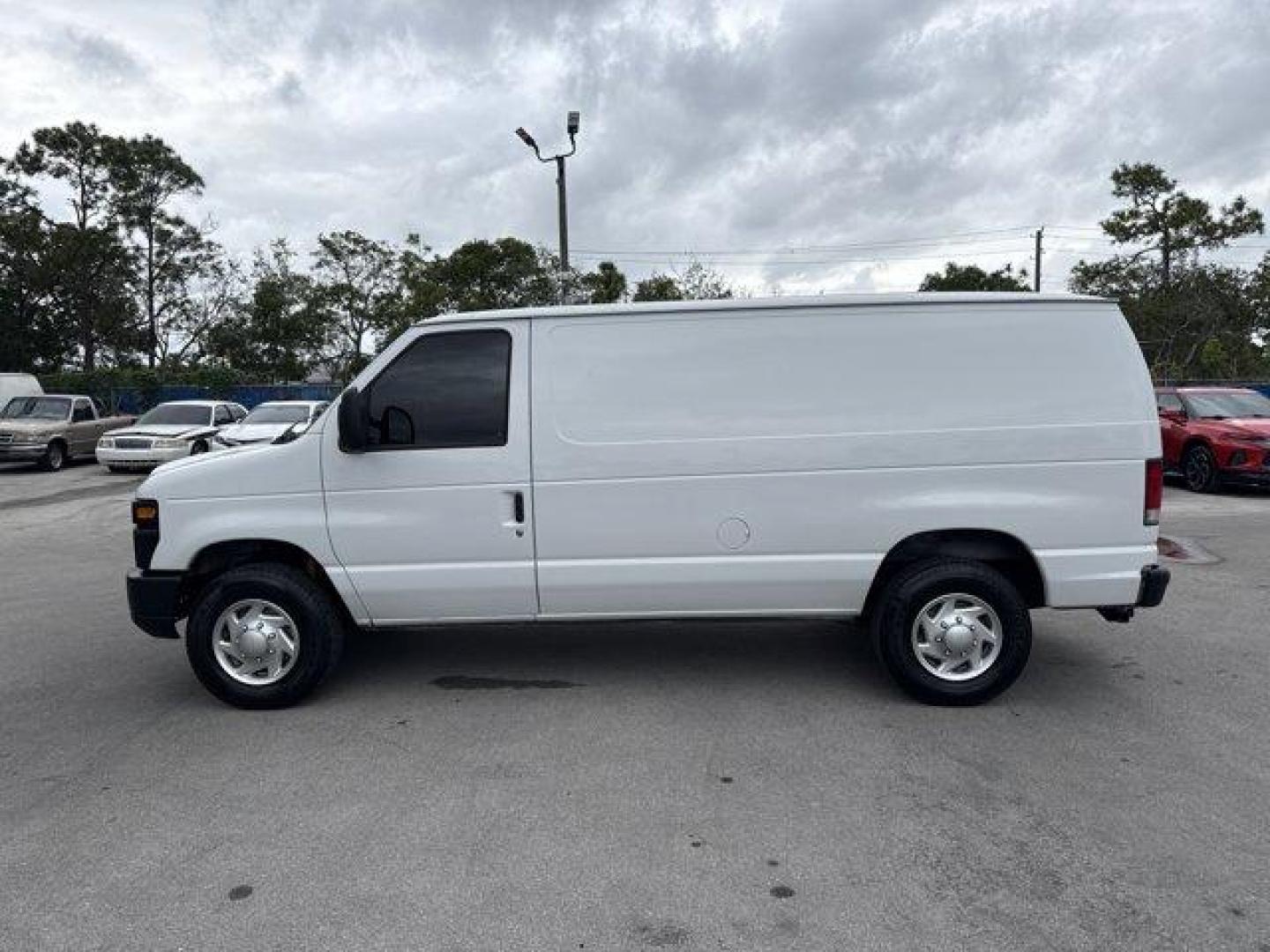 2014 White Ford Econoline Cargo Van (1FTNE2EW9ED) with an 8 4.6 L engine, Automatic transmission, located at 27610 S Dixie Hwy, Homestead, FL, 33032, (305) 749-2348, 25.510241, -80.438301 - KBB.com Brand Image Awards. Only 129,906 Miles! Delivers 16 Highway MPG and 13 City MPG! This Ford Econoline Cargo Van delivers a Regular Unleaded V-8 4.6 L/281 engine powering this Automatic transmission. Wheels: 16 x 7 Steel, Variable Intermittent Wipers, Urethane Gear Shifter Material.*This Ford - Photo#1