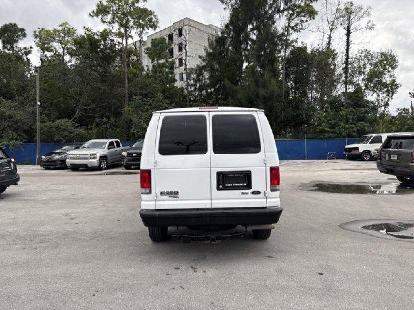 2014 White Ford Econoline Cargo Van (1FTNE2EW9ED) with an 8 4.6 L engine, Automatic transmission, located at 27610 S Dixie Hwy, Homestead, FL, 33032, (305) 749-2348, 25.510241, -80.438301 - KBB.com Brand Image Awards. Only 129,906 Miles! Delivers 16 Highway MPG and 13 City MPG! This Ford Econoline Cargo Van delivers a Regular Unleaded V-8 4.6 L/281 engine powering this Automatic transmission. Wheels: 16 x 7 Steel, Variable Intermittent Wipers, Urethane Gear Shifter Material.*This Ford - Photo#3