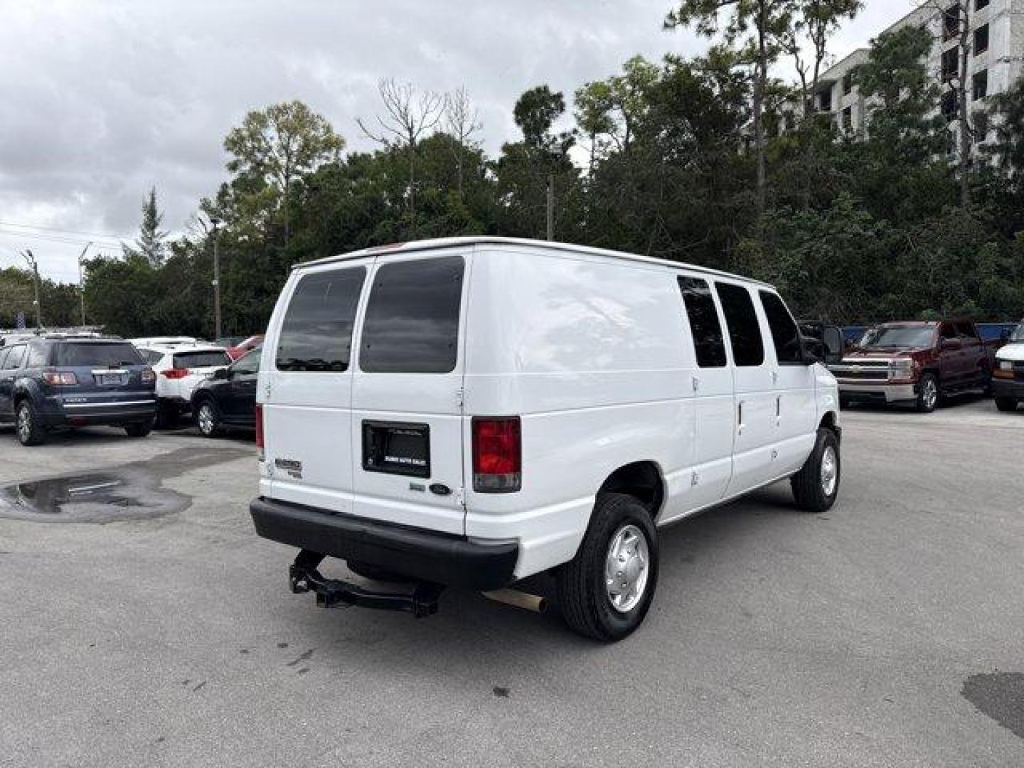 2014 White Ford Econoline Cargo Van (1FTNE2EW9ED) with an 8 4.6 L engine, Automatic transmission, located at 27610 S Dixie Hwy, Homestead, FL, 33032, (305) 749-2348, 25.510241, -80.438301 - KBB.com Brand Image Awards. Only 129,906 Miles! Delivers 16 Highway MPG and 13 City MPG! This Ford Econoline Cargo Van delivers a Regular Unleaded V-8 4.6 L/281 engine powering this Automatic transmission. Wheels: 16 x 7 Steel, Variable Intermittent Wipers, Urethane Gear Shifter Material.*This Ford - Photo#4