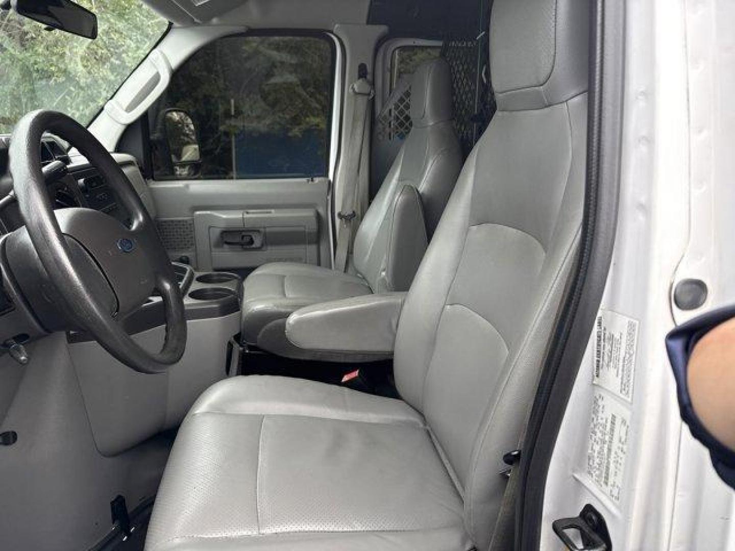 2014 White Ford Econoline Cargo Van (1FTNE2EW9ED) with an 8 4.6 L engine, Automatic transmission, located at 27610 S Dixie Hwy, Homestead, FL, 33032, (305) 749-2348, 25.510241, -80.438301 - KBB.com Brand Image Awards. Only 129,906 Miles! Delivers 16 Highway MPG and 13 City MPG! This Ford Econoline Cargo Van delivers a Regular Unleaded V-8 4.6 L/281 engine powering this Automatic transmission. Wheels: 16 x 7 Steel, Variable Intermittent Wipers, Urethane Gear Shifter Material.*This Ford - Photo#11