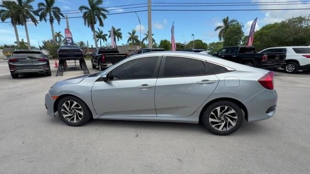 2018 Silver Honda Civic Sedan (2HGFC2F83JH) with an 4 2.0 L engine, Variable transmission, located at 27610 S Dixie Hwy, Homestead, FL, 33032, (305) 749-2348, 25.510241, -80.438301 - KBB.com 10 Most Awarded Brands. Scores 40 Highway MPG and 31 City MPG! This Honda Civic Sedan boasts a Regular Unleaded I-4 2.0 L/122 engine powering this Variable transmission. Wireless Phone Connectivity, Window Grid Antenna, Wheels: 16 Alloy.* This Honda Civic Sedan Features the Following Options - Photo#1