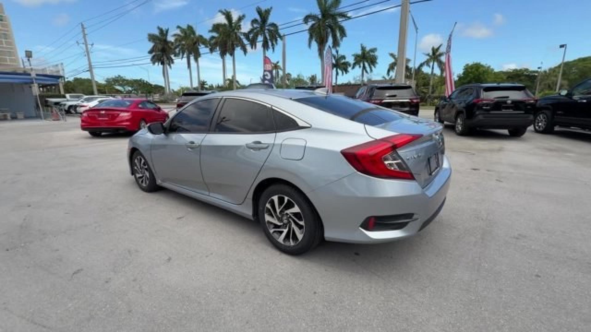 2018 Silver Honda Civic Sedan (2HGFC2F83JH) with an 4 2.0 L engine, Variable transmission, located at 27610 S Dixie Hwy, Homestead, FL, 33032, (305) 749-2348, 25.510241, -80.438301 - KBB.com 10 Most Awarded Brands. Scores 40 Highway MPG and 31 City MPG! This Honda Civic Sedan boasts a Regular Unleaded I-4 2.0 L/122 engine powering this Variable transmission. Wireless Phone Connectivity, Window Grid Antenna, Wheels: 16 Alloy.* This Honda Civic Sedan Features the Following Options- Photo#2