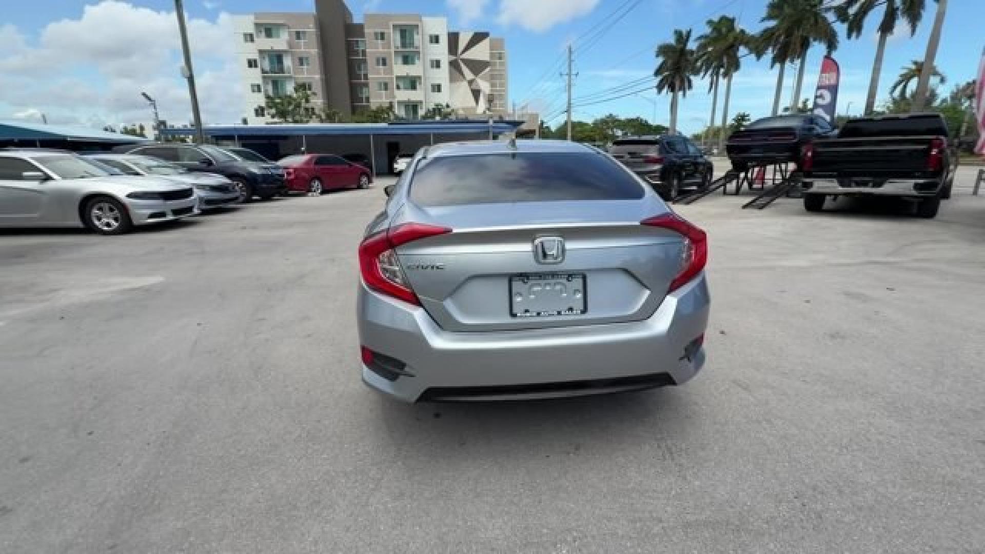 2018 Silver Honda Civic Sedan (2HGFC2F83JH) with an 4 2.0 L engine, Variable transmission, located at 27610 S Dixie Hwy, Homestead, FL, 33032, (305) 749-2348, 25.510241, -80.438301 - KBB.com 10 Most Awarded Brands. Scores 40 Highway MPG and 31 City MPG! This Honda Civic Sedan boasts a Regular Unleaded I-4 2.0 L/122 engine powering this Variable transmission. Wireless Phone Connectivity, Window Grid Antenna, Wheels: 16 Alloy.* This Honda Civic Sedan Features the Following Options- Photo#3