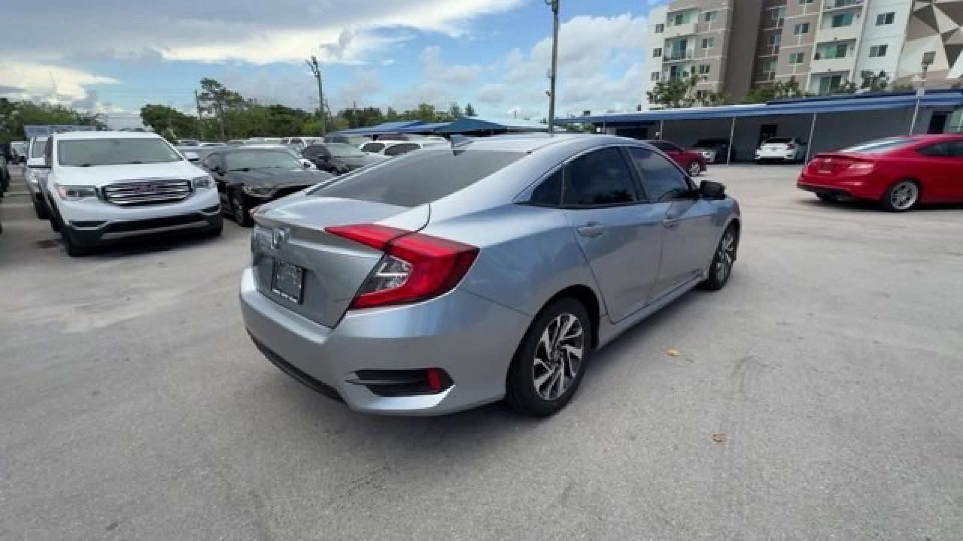 2018 Silver Honda Civic Sedan (2HGFC2F83JH) with an 4 2.0 L engine, Variable transmission, located at 27610 S Dixie Hwy, Homestead, FL, 33032, (305) 749-2348, 25.510241, -80.438301 - KBB.com 10 Most Awarded Brands. Scores 40 Highway MPG and 31 City MPG! This Honda Civic Sedan boasts a Regular Unleaded I-4 2.0 L/122 engine powering this Variable transmission. Wireless Phone Connectivity, Window Grid Antenna, Wheels: 16 Alloy.* This Honda Civic Sedan Features the Following Options- Photo#4