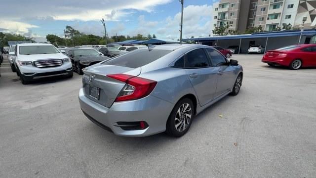 2018 Silver Honda Civic Sedan (2HGFC2F83JH) with an 4 2.0 L engine, Variable transmission, located at 27610 S Dixie Hwy, Homestead, FL, 33032, (305) 749-2348, 25.510241, -80.438301 - KBB.com 10 Most Awarded Brands. Scores 40 Highway MPG and 31 City MPG! This Honda Civic Sedan boasts a Regular Unleaded I-4 2.0 L/122 engine powering this Variable transmission. Wireless Phone Connectivity, Window Grid Antenna, Wheels: 16 Alloy.* This Honda Civic Sedan Features the Following Options - Photo#4