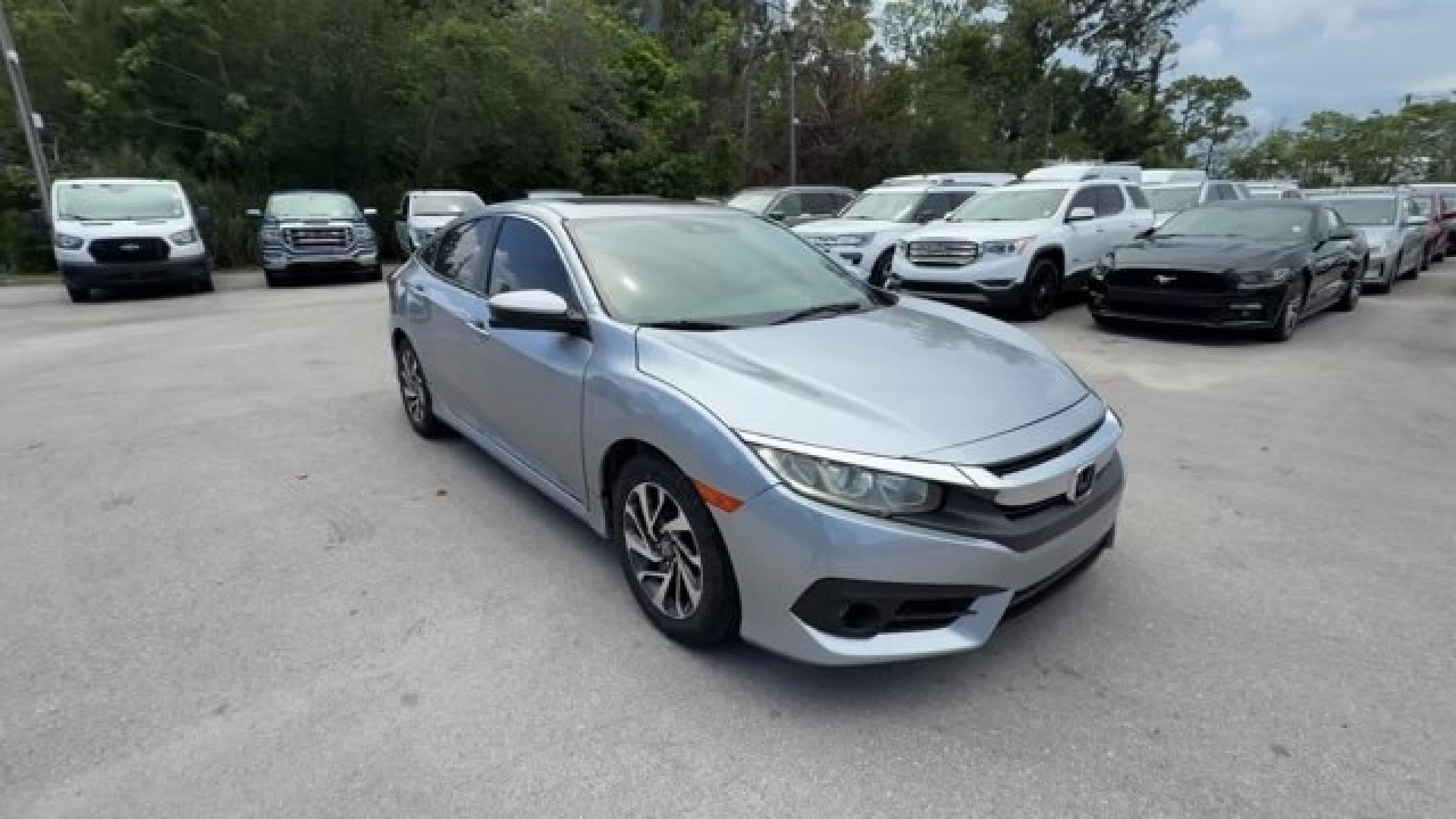 2018 Silver Honda Civic Sedan (2HGFC2F83JH) with an 4 2.0 L engine, Variable transmission, located at 27610 S Dixie Hwy, Homestead, FL, 33032, (305) 749-2348, 25.510241, -80.438301 - KBB.com 10 Most Awarded Brands. Scores 40 Highway MPG and 31 City MPG! This Honda Civic Sedan boasts a Regular Unleaded I-4 2.0 L/122 engine powering this Variable transmission. Wireless Phone Connectivity, Window Grid Antenna, Wheels: 16 Alloy.* This Honda Civic Sedan Features the Following Options- Photo#6