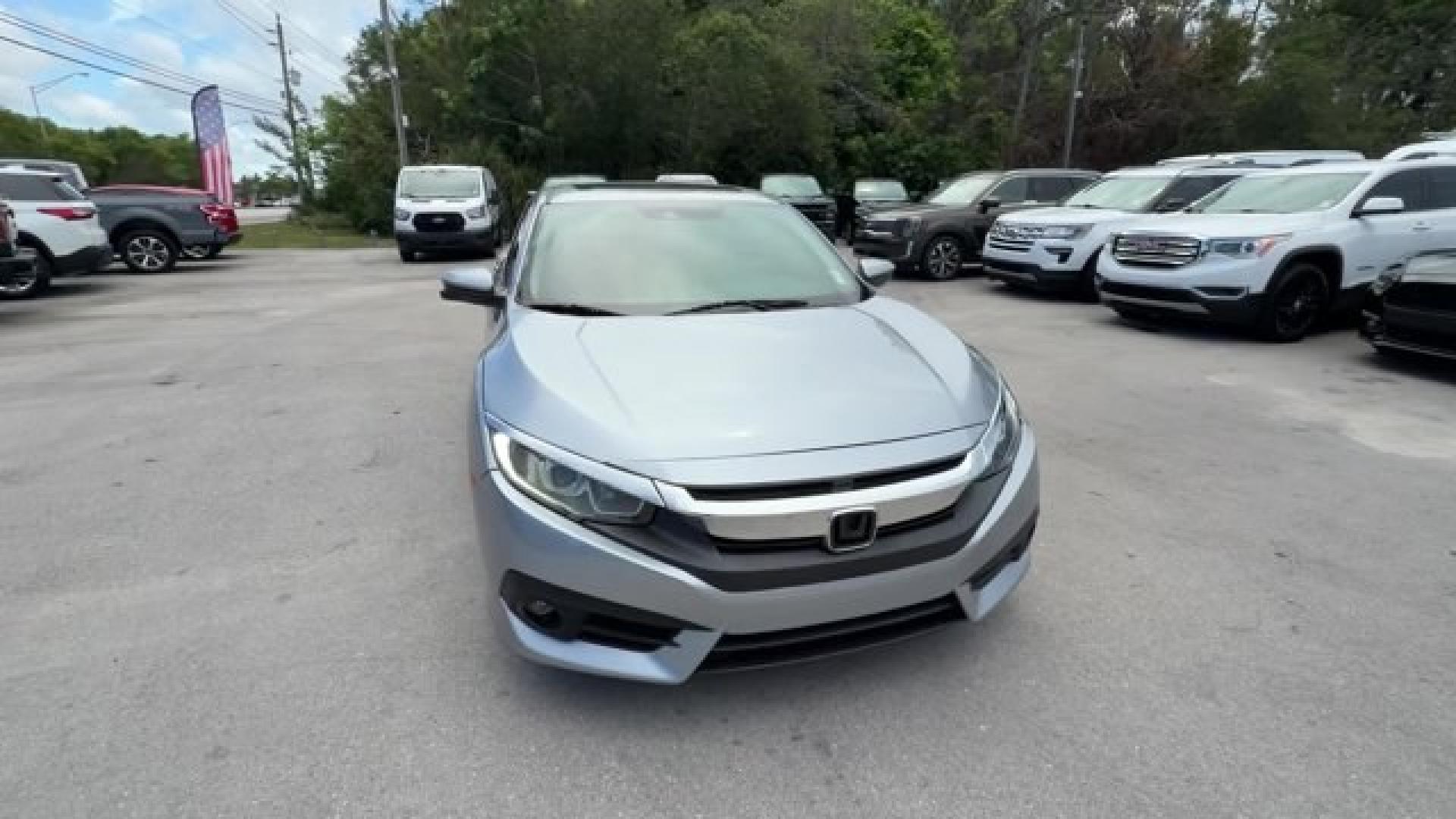 2018 Silver Honda Civic Sedan (2HGFC2F83JH) with an 4 2.0 L engine, Variable transmission, located at 27610 S Dixie Hwy, Homestead, FL, 33032, (305) 749-2348, 25.510241, -80.438301 - KBB.com 10 Most Awarded Brands. Scores 40 Highway MPG and 31 City MPG! This Honda Civic Sedan boasts a Regular Unleaded I-4 2.0 L/122 engine powering this Variable transmission. Wireless Phone Connectivity, Window Grid Antenna, Wheels: 16 Alloy.* This Honda Civic Sedan Features the Following Options- Photo#7