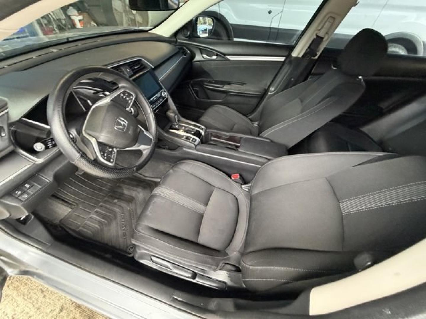 2018 Silver Honda Civic Sedan (2HGFC2F83JH) with an 4 2.0 L engine, Variable transmission, located at 27610 S Dixie Hwy, Homestead, FL, 33032, (305) 749-2348, 25.510241, -80.438301 - KBB.com 10 Most Awarded Brands. Scores 40 Highway MPG and 31 City MPG! This Honda Civic Sedan boasts a Regular Unleaded I-4 2.0 L/122 engine powering this Variable transmission. Wireless Phone Connectivity, Window Grid Antenna, Wheels: 16 Alloy.* This Honda Civic Sedan Features the Following Options- Photo#8