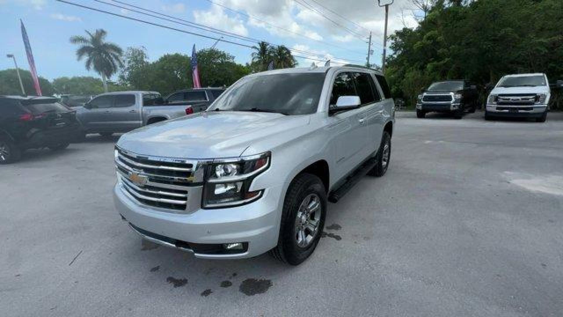 2017 Silver Ice Metallic /Jet Black Chevrolet Tahoe (1GNSKBKC7HR) with an 8 5.3L engine, Automatic transmission, located at 27610 S Dixie Hwy, Homestead, FL, 33032, (305) 749-2348, 25.510241, -80.438301 - KBB.com Best Buy Awards. Delivers 22 Highway MPG and 16 City MPG! This Chevrolet Tahoe boasts a Gas/Ethanol V8 5.3L/325 engine powering this Automatic transmission. WIRELESS CHARGING, WHEELS, 18 X 8.5 (45.7 CM X 21.6 CM) PAINTED ALUMINUM, TRANSMISSION, 6-SPEED AUTOMATIC, ELECTRONICALLY CONTROLLED wi - Photo#0