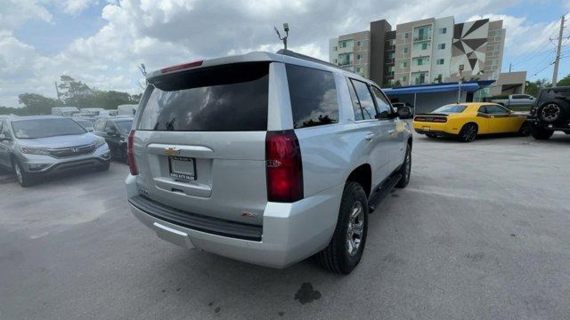 2017 Silver Ice Metallic /Jet Black Chevrolet Tahoe (1GNSKBKC7HR) with an 8 5.3L engine, Automatic transmission, located at 27610 S Dixie Hwy, Homestead, FL, 33032, (305) 749-2348, 25.510241, -80.438301 - KBB.com Best Buy Awards. Delivers 22 Highway MPG and 16 City MPG! This Chevrolet Tahoe boasts a Gas/Ethanol V8 5.3L/325 engine powering this Automatic transmission. WIRELESS CHARGING, WHEELS, 18 X 8.5 (45.7 CM X 21.6 CM) PAINTED ALUMINUM, TRANSMISSION, 6-SPEED AUTOMATIC, ELECTRONICALLY CONTROLLED wi - Photo#4