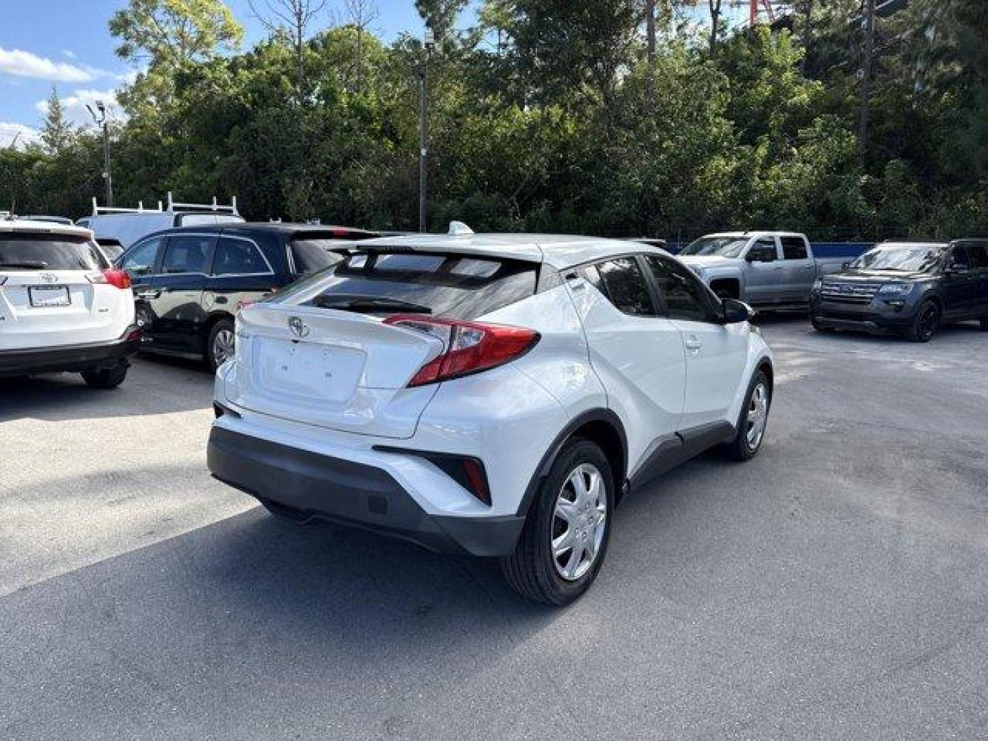 2019 White Toyota C-HR (JTNKHMBX8K1) with an 4 2.0 L engine, Variable transmission, located at 27610 S Dixie Hwy, Homestead, FL, 33032, (305) 749-2348, 25.510241, -80.438301 - KBB.com Brand Image Awards. Scores 31 Highway MPG and 27 City MPG! This Toyota C-HR delivers a Regular Unleaded I-4 2.0 L/121 engine powering this Variable transmission. Wing Spoiler, VSC Electronic Stability Control (ESC), Variable Intermittent Wipers.*This Toyota C-HR Comes Equipped with These Opt - Photo#4