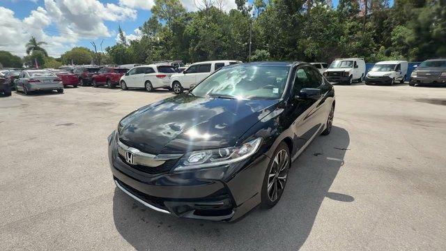 2016 Black Honda Accord Coupe (1HGCT1B75GA) with an 4 2.4 L engine, Variable transmission, located at 27610 S Dixie Hwy, Homestead, FL, 33032, (305) 749-2348, 25.510241, -80.438301 - KBB.com Brand Image Awards. Delivers 35 Highway MPG and 26 City MPG! This Honda Accord Coupe boasts a Regular Unleaded I-4 2.4 L/144 engine powering this Variable transmission. Window Grid Antenna, Wheels: 18 Alloy, VSA Electronic Stability Control (ESC).*This Honda Accord Coupe Comes Equipped with - Photo#0