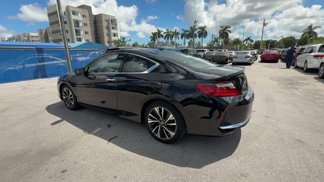 2016 Black Honda Accord Coupe (1HGCT1B75GA) with an 4 2.4 L engine, Variable transmission, located at 27610 S Dixie Hwy, Homestead, FL, 33032, (305) 749-2348, 25.510241, -80.438301 - KBB.com Brand Image Awards. Delivers 35 Highway MPG and 26 City MPG! This Honda Accord Coupe boasts a Regular Unleaded I-4 2.4 L/144 engine powering this Variable transmission. Window Grid Antenna, Wheels: 18 Alloy, VSA Electronic Stability Control (ESC).*This Honda Accord Coupe Comes Equipped with - Photo#2
