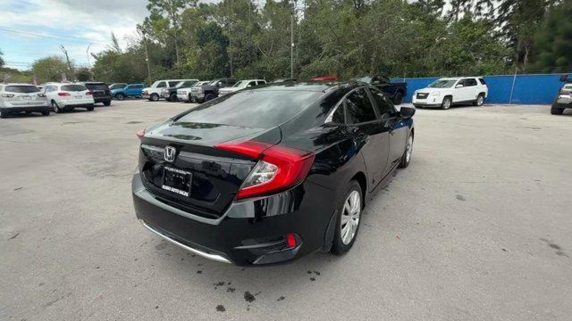 2019 Black Honda Civic Sedan (19XFC2F64KE) with an 4 2.0 L engine, Variable transmission, located at 27610 S Dixie Hwy, Homestead, FL, 33032, (305) 749-2348, 25.510241, -80.438301 - Delivers 38 Highway MPG and 30 City MPG! This Honda Civic Sedan delivers a Regular Unleaded I-4 2.0 L/122 engine powering this Variable transmission. Window Grid Antenna, Wheels: 16 w/Full Covers, VSA Electronic Stability Control (ESC).* This Honda Civic Sedan Features the Following Options *Trunk R - Photo#4