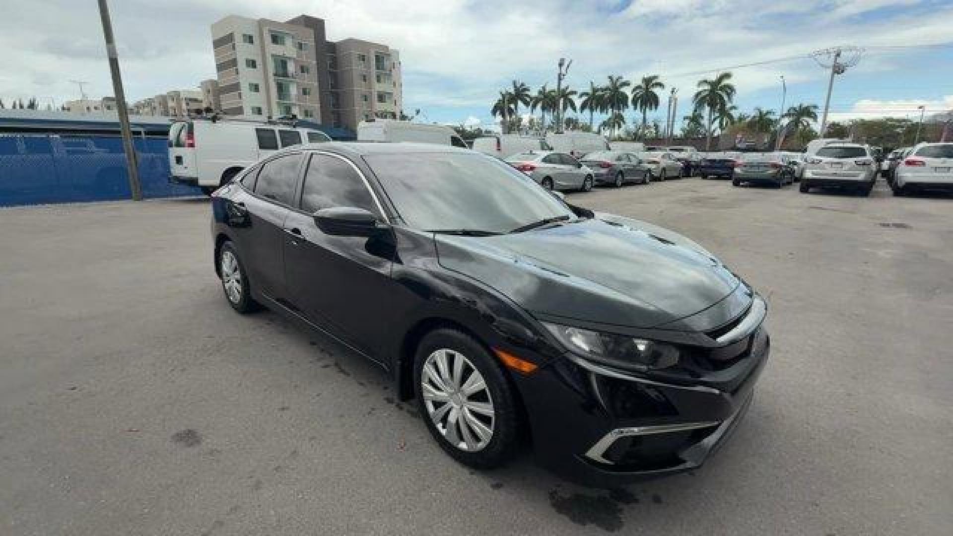 2019 Black Honda Civic Sedan (19XFC2F64KE) with an 4 2.0 L engine, Variable transmission, located at 27610 S Dixie Hwy, Homestead, FL, 33032, (305) 749-2348, 25.510241, -80.438301 - Delivers 38 Highway MPG and 30 City MPG! This Honda Civic Sedan delivers a Regular Unleaded I-4 2.0 L/122 engine powering this Variable transmission. Window Grid Antenna, Wheels: 16 w/Full Covers, VSA Electronic Stability Control (ESC).* This Honda Civic Sedan Features the Following Options *Trunk R - Photo#6