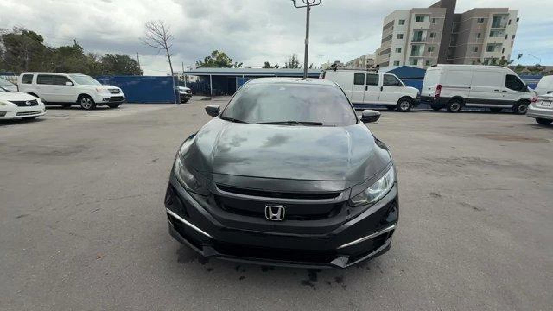2019 Black Honda Civic Sedan (19XFC2F64KE) with an 4 2.0 L engine, Variable transmission, located at 27610 S Dixie Hwy, Homestead, FL, 33032, (305) 749-2348, 25.510241, -80.438301 - Delivers 38 Highway MPG and 30 City MPG! This Honda Civic Sedan delivers a Regular Unleaded I-4 2.0 L/122 engine powering this Variable transmission. Window Grid Antenna, Wheels: 16 w/Full Covers, VSA Electronic Stability Control (ESC).* This Honda Civic Sedan Features the Following Options *Trunk R - Photo#7