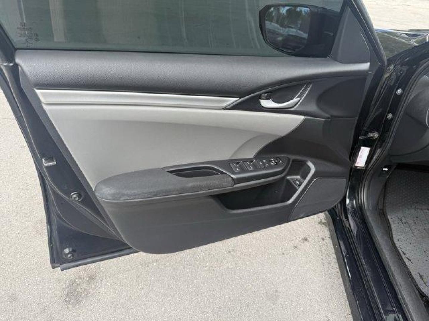 2019 Black Honda Civic Sedan (19XFC2F64KE) with an 4 2.0 L engine, Variable transmission, located at 27610 S Dixie Hwy, Homestead, FL, 33032, (305) 749-2348, 25.510241, -80.438301 - Delivers 38 Highway MPG and 30 City MPG! This Honda Civic Sedan delivers a Regular Unleaded I-4 2.0 L/122 engine powering this Variable transmission. Window Grid Antenna, Wheels: 16 w/Full Covers, VSA Electronic Stability Control (ESC).* This Honda Civic Sedan Features the Following Options *Trunk R - Photo#10