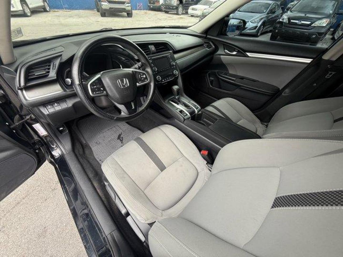 2019 Black Honda Civic Sedan (19XFC2F64KE) with an 4 2.0 L engine, Variable transmission, located at 27610 S Dixie Hwy, Homestead, FL, 33032, (305) 749-2348, 25.510241, -80.438301 - Delivers 38 Highway MPG and 30 City MPG! This Honda Civic Sedan delivers a Regular Unleaded I-4 2.0 L/122 engine powering this Variable transmission. Window Grid Antenna, Wheels: 16 w/Full Covers, VSA Electronic Stability Control (ESC).* This Honda Civic Sedan Features the Following Options *Trunk R - Photo#11