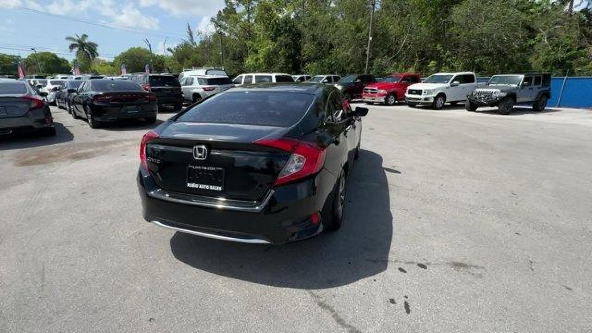 2019 Black Honda Civic Sedan (19XFC2F67KE) with an 4 2.0 L engine, Variable transmission, located at 27610 S Dixie Hwy, Homestead, FL, 33032, (305) 749-2348, 25.510241, -80.438301 - Boasts 38 Highway MPG and 30 City MPG! This Honda Civic Sedan boasts a Regular Unleaded I-4 2.0 L/122 engine powering this Variable transmission. Window Grid Antenna, Wheels: 16 w/Full Covers, VSA Electronic Stability Control (ESC).*This Honda Civic Sedan Comes Equipped with These Options *Trunk Rea - Photo#5