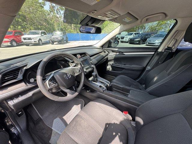 2019 Black Honda Civic Sedan (19XFC2F67KE) with an 4 2.0 L engine, Variable transmission, located at 27610 S Dixie Hwy, Homestead, FL, 33032, (305) 749-2348, 25.510241, -80.438301 - Boasts 38 Highway MPG and 30 City MPG! This Honda Civic Sedan boasts a Regular Unleaded I-4 2.0 L/122 engine powering this Variable transmission. Window Grid Antenna, Wheels: 16 w/Full Covers, VSA Electronic Stability Control (ESC).*This Honda Civic Sedan Comes Equipped with These Options *Trunk Rea - Photo#10