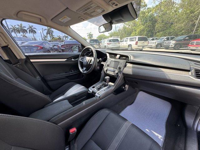 2019 Black Honda Civic Sedan (19XFC2F67KE) with an 4 2.0 L engine, Variable transmission, located at 27610 S Dixie Hwy, Homestead, FL, 33032, (305) 749-2348, 25.510241, -80.438301 - Boasts 38 Highway MPG and 30 City MPG! This Honda Civic Sedan boasts a Regular Unleaded I-4 2.0 L/122 engine powering this Variable transmission. Window Grid Antenna, Wheels: 16 w/Full Covers, VSA Electronic Stability Control (ESC).*This Honda Civic Sedan Comes Equipped with These Options *Trunk Rea - Photo#11