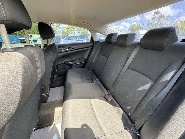 2019 Black Honda Civic Sedan (19XFC2F67KE) with an 4 2.0 L engine, Variable transmission, located at 27610 S Dixie Hwy, Homestead, FL, 33032, (305) 749-2348, 25.510241, -80.438301 - Boasts 38 Highway MPG and 30 City MPG! This Honda Civic Sedan boasts a Regular Unleaded I-4 2.0 L/122 engine powering this Variable transmission. Window Grid Antenna, Wheels: 16 w/Full Covers, VSA Electronic Stability Control (ESC).*This Honda Civic Sedan Comes Equipped with These Options *Trunk Rea - Photo#13