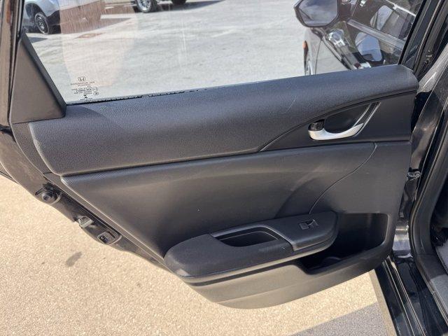 2019 Black Honda Civic Sedan (19XFC2F67KE) with an 4 2.0 L engine, Variable transmission, located at 27610 S Dixie Hwy, Homestead, FL, 33032, (305) 749-2348, 25.510241, -80.438301 - Boasts 38 Highway MPG and 30 City MPG! This Honda Civic Sedan boasts a Regular Unleaded I-4 2.0 L/122 engine powering this Variable transmission. Window Grid Antenna, Wheels: 16 w/Full Covers, VSA Electronic Stability Control (ESC).*This Honda Civic Sedan Comes Equipped with These Options *Trunk Rea - Photo#16