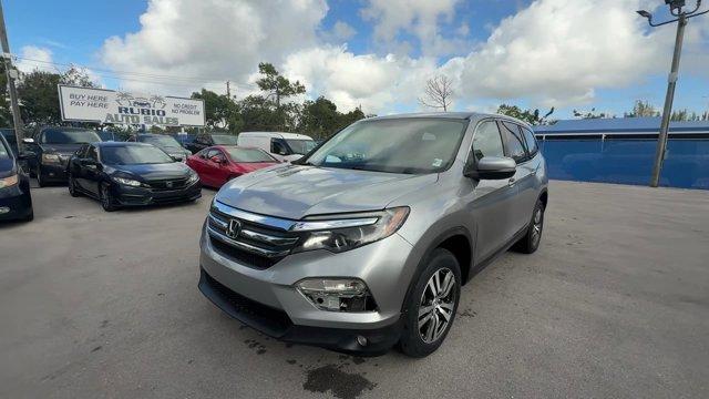 2017 Silver Honda Pilot (5FNYF5H36HB) with an 6 3.5 L engine, Automatic transmission, located at 27610 S Dixie Hwy, Homestead, FL, 33032, (305) 749-2348, 25.510241, -80.438301 - IIHS Top Safety Pick+. Boasts 27 Highway MPG and 19 City MPG! This Honda Pilot delivers a Regular Unleaded V-6 3.5 L/212 engine powering this Automatic transmission. Window Grid Antenna, Wheels: 18 Alloy, Wheels w/Machined Accents.* This Honda Pilot Features the Following Options *VSA Electronic Sta - Photo#0