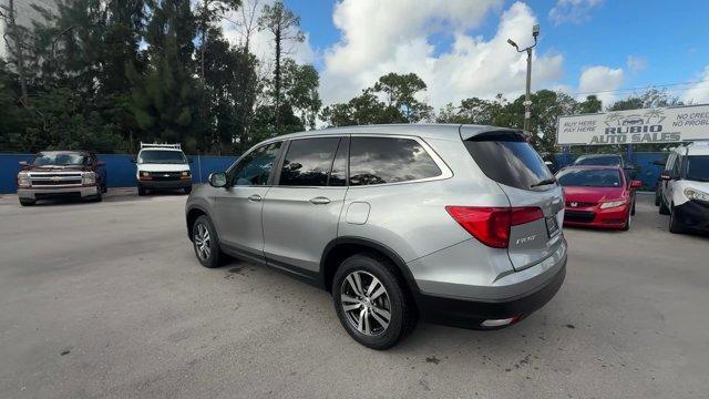 2017 Silver Honda Pilot (5FNYF5H36HB) with an 6 3.5 L engine, Automatic transmission, located at 27610 S Dixie Hwy, Homestead, FL, 33032, (305) 749-2348, 25.510241, -80.438301 - IIHS Top Safety Pick+. Boasts 27 Highway MPG and 19 City MPG! This Honda Pilot delivers a Regular Unleaded V-6 3.5 L/212 engine powering this Automatic transmission. Window Grid Antenna, Wheels: 18 Alloy, Wheels w/Machined Accents.* This Honda Pilot Features the Following Options *VSA Electronic Sta - Photo#2