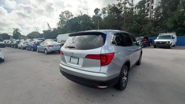 2017 Silver Honda Pilot (5FNYF5H36HB) with an 6 3.5 L engine, Automatic transmission, located at 27610 S Dixie Hwy, Homestead, FL, 33032, (305) 749-2348, 25.510241, -80.438301 - IIHS Top Safety Pick+. Boasts 27 Highway MPG and 19 City MPG! This Honda Pilot delivers a Regular Unleaded V-6 3.5 L/212 engine powering this Automatic transmission. Window Grid Antenna, Wheels: 18 Alloy, Wheels w/Machined Accents.* This Honda Pilot Features the Following Options *VSA Electronic Sta - Photo#4