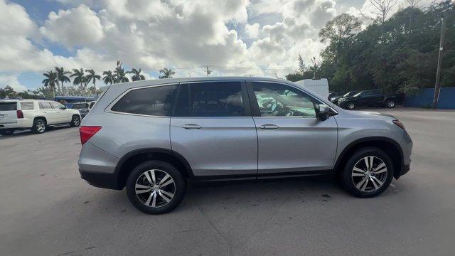 2017 Silver Honda Pilot (5FNYF5H36HB) with an 6 3.5 L engine, Automatic transmission, located at 27610 S Dixie Hwy, Homestead, FL, 33032, (305) 749-2348, 25.510241, -80.438301 - IIHS Top Safety Pick+. Boasts 27 Highway MPG and 19 City MPG! This Honda Pilot delivers a Regular Unleaded V-6 3.5 L/212 engine powering this Automatic transmission. Window Grid Antenna, Wheels: 18 Alloy, Wheels w/Machined Accents.* This Honda Pilot Features the Following Options *VSA Electronic Sta - Photo#5