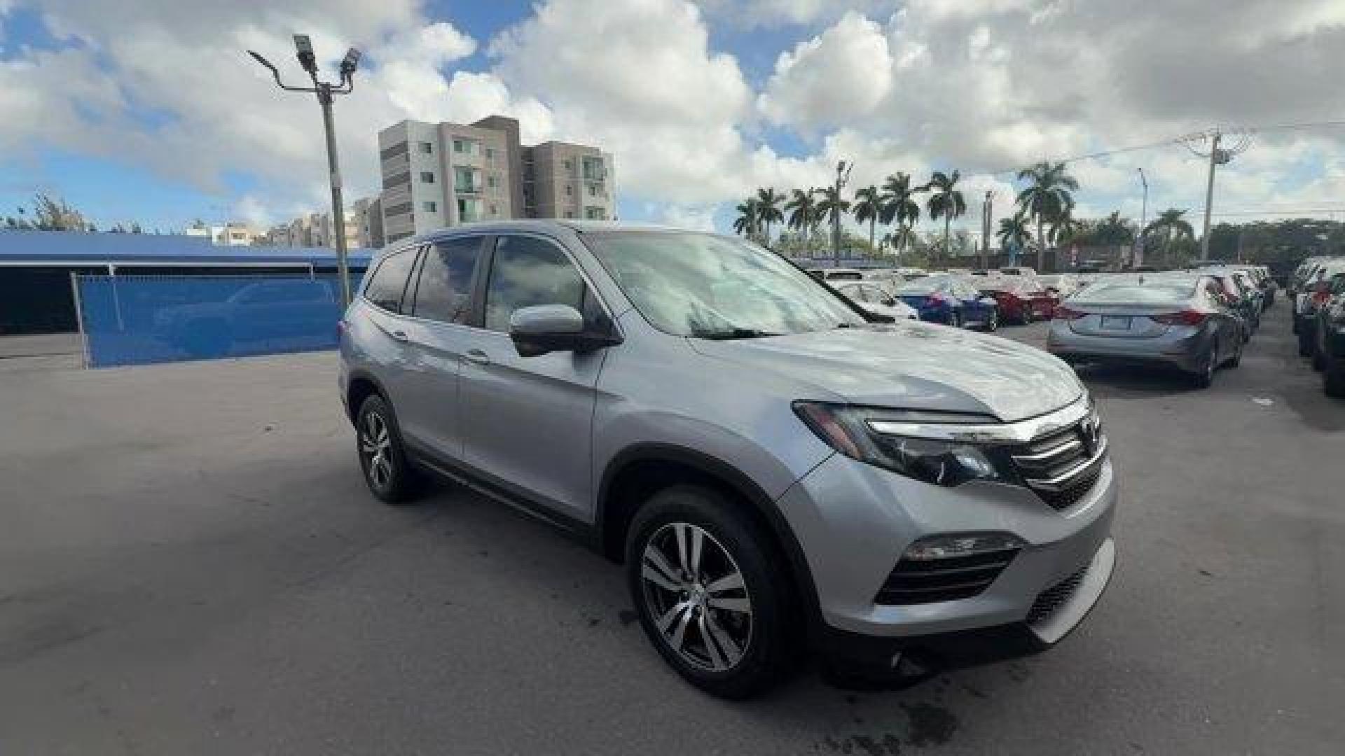 2017 Silver Honda Pilot (5FNYF5H36HB) with an 6 3.5 L engine, Automatic transmission, located at 27610 S Dixie Hwy, Homestead, FL, 33032, (305) 749-2348, 25.510241, -80.438301 - IIHS Top Safety Pick+. Boasts 27 Highway MPG and 19 City MPG! This Honda Pilot delivers a Regular Unleaded V-6 3.5 L/212 engine powering this Automatic transmission. Window Grid Antenna, Wheels: 18 Alloy, Wheels w/Machined Accents.* This Honda Pilot Features the Following Options *VSA Electronic Sta - Photo#6