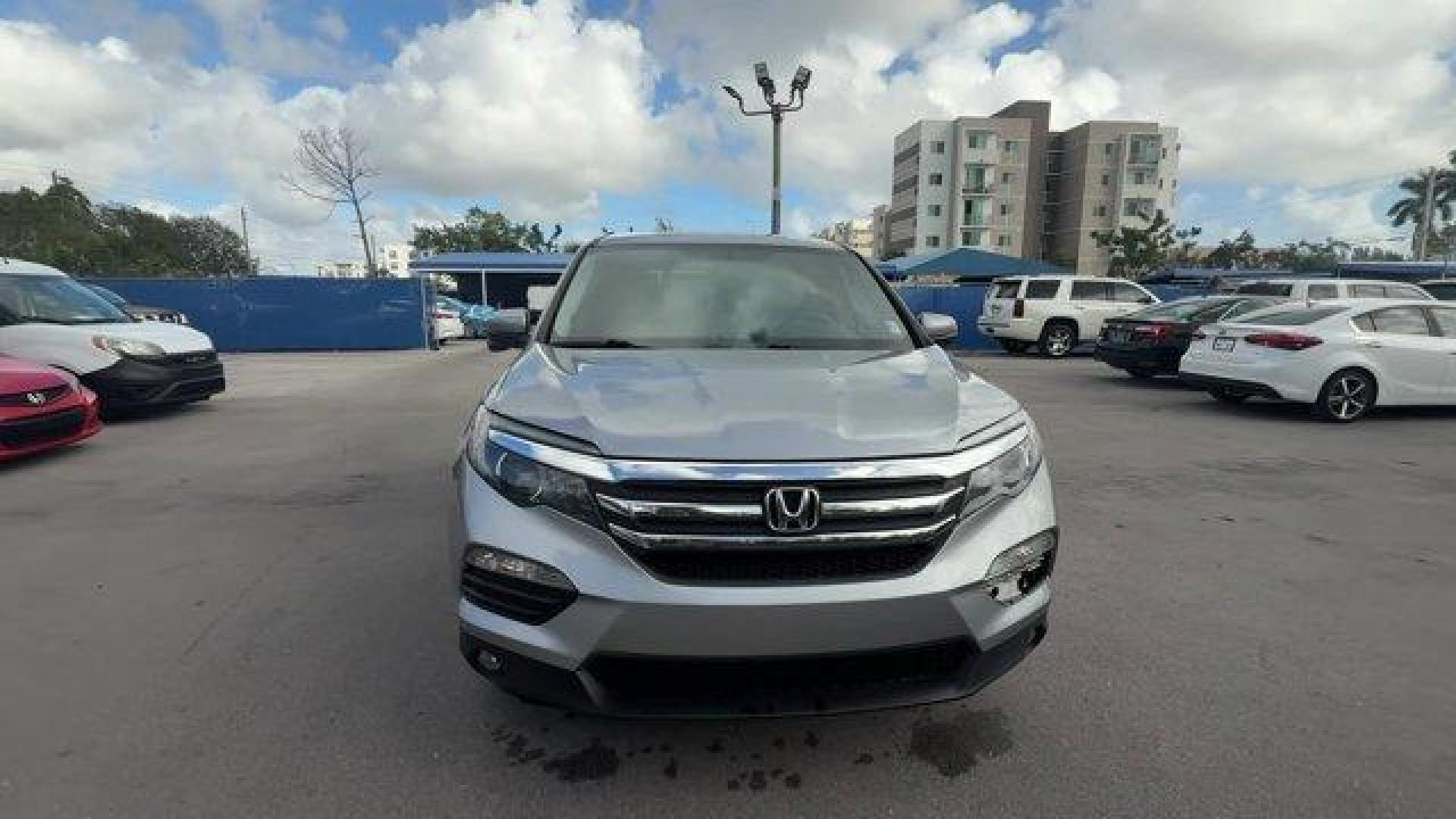 2017 Silver Honda Pilot (5FNYF5H36HB) with an 6 3.5 L engine, Automatic transmission, located at 27610 S Dixie Hwy, Homestead, FL, 33032, (305) 749-2348, 25.510241, -80.438301 - IIHS Top Safety Pick+. Boasts 27 Highway MPG and 19 City MPG! This Honda Pilot delivers a Regular Unleaded V-6 3.5 L/212 engine powering this Automatic transmission. Window Grid Antenna, Wheels: 18 Alloy, Wheels w/Machined Accents.* This Honda Pilot Features the Following Options *VSA Electronic Sta - Photo#7