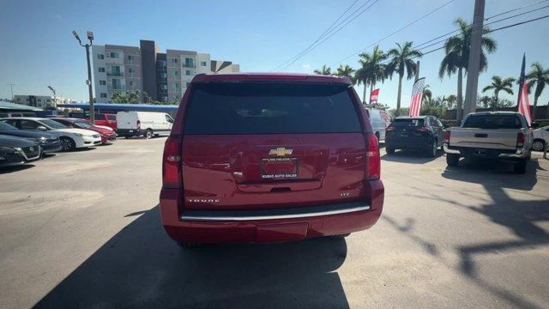2015 Crystal Red Tintcoat /Cocoa/Dune Chevrolet Tahoe (1GNSCCKC8FR) with an 8 5.3L engine, Automatic transmission, located at 27610 S Dixie Hwy, Homestead, FL, 33032, (305) 749-2348, 25.510241, -80.438301 - KBB.com 15 Best Family Cars. Boasts 23 Highway MPG and 16 City MPG! This Chevrolet Tahoe boasts a Gas/Ethanol V8 5.3L/ engine powering this Automatic transmission. WHEELS, 22 (55.9 CM) PREMIUM PAINTED with chrome inserts, TRANSMISSION, 6-SPEED AUTOMATIC, ELECTRONICALLY CONTROLLED with overdrive and - Photo#3