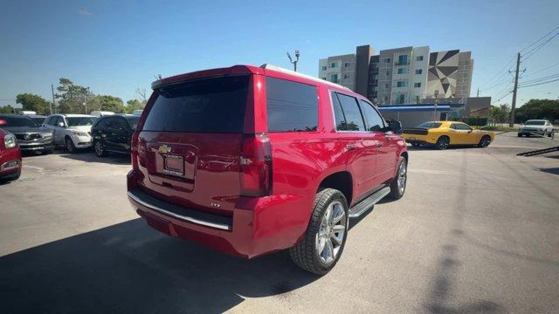 2015 Crystal Red Tintcoat /Cocoa/Dune Chevrolet Tahoe (1GNSCCKC8FR) with an 8 5.3L engine, Automatic transmission, located at 27610 S Dixie Hwy, Homestead, FL, 33032, (305) 749-2348, 25.510241, -80.438301 - KBB.com 15 Best Family Cars. Boasts 23 Highway MPG and 16 City MPG! This Chevrolet Tahoe boasts a Gas/Ethanol V8 5.3L/ engine powering this Automatic transmission. WHEELS, 22 (55.9 CM) PREMIUM PAINTED with chrome inserts, TRANSMISSION, 6-SPEED AUTOMATIC, ELECTRONICALLY CONTROLLED with overdrive and - Photo#4