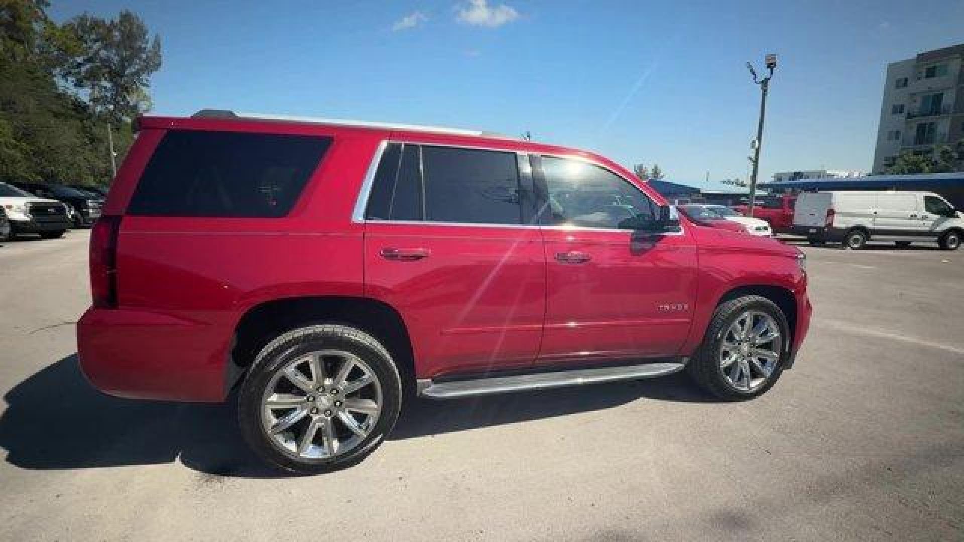 2015 Crystal Red Tintcoat /Cocoa/Dune Chevrolet Tahoe (1GNSCCKC8FR) with an 8 5.3L engine, Automatic transmission, located at 27610 S Dixie Hwy, Homestead, FL, 33032, (305) 749-2348, 25.510241, -80.438301 - KBB.com 15 Best Family Cars. Boasts 23 Highway MPG and 16 City MPG! This Chevrolet Tahoe boasts a Gas/Ethanol V8 5.3L/ engine powering this Automatic transmission. WHEELS, 22 (55.9 CM) PREMIUM PAINTED with chrome inserts, TRANSMISSION, 6-SPEED AUTOMATIC, ELECTRONICALLY CONTROLLED with overdrive and - Photo#5