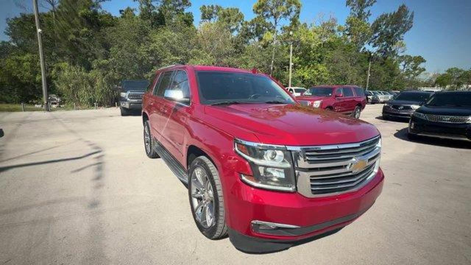 2015 Crystal Red Tintcoat /Cocoa/Dune Chevrolet Tahoe (1GNSCCKC8FR) with an 8 5.3L engine, Automatic transmission, located at 27610 S Dixie Hwy, Homestead, FL, 33032, (305) 749-2348, 25.510241, -80.438301 - KBB.com 15 Best Family Cars. Boasts 23 Highway MPG and 16 City MPG! This Chevrolet Tahoe boasts a Gas/Ethanol V8 5.3L/ engine powering this Automatic transmission. WHEELS, 22 (55.9 CM) PREMIUM PAINTED with chrome inserts, TRANSMISSION, 6-SPEED AUTOMATIC, ELECTRONICALLY CONTROLLED with overdrive and - Photo#6