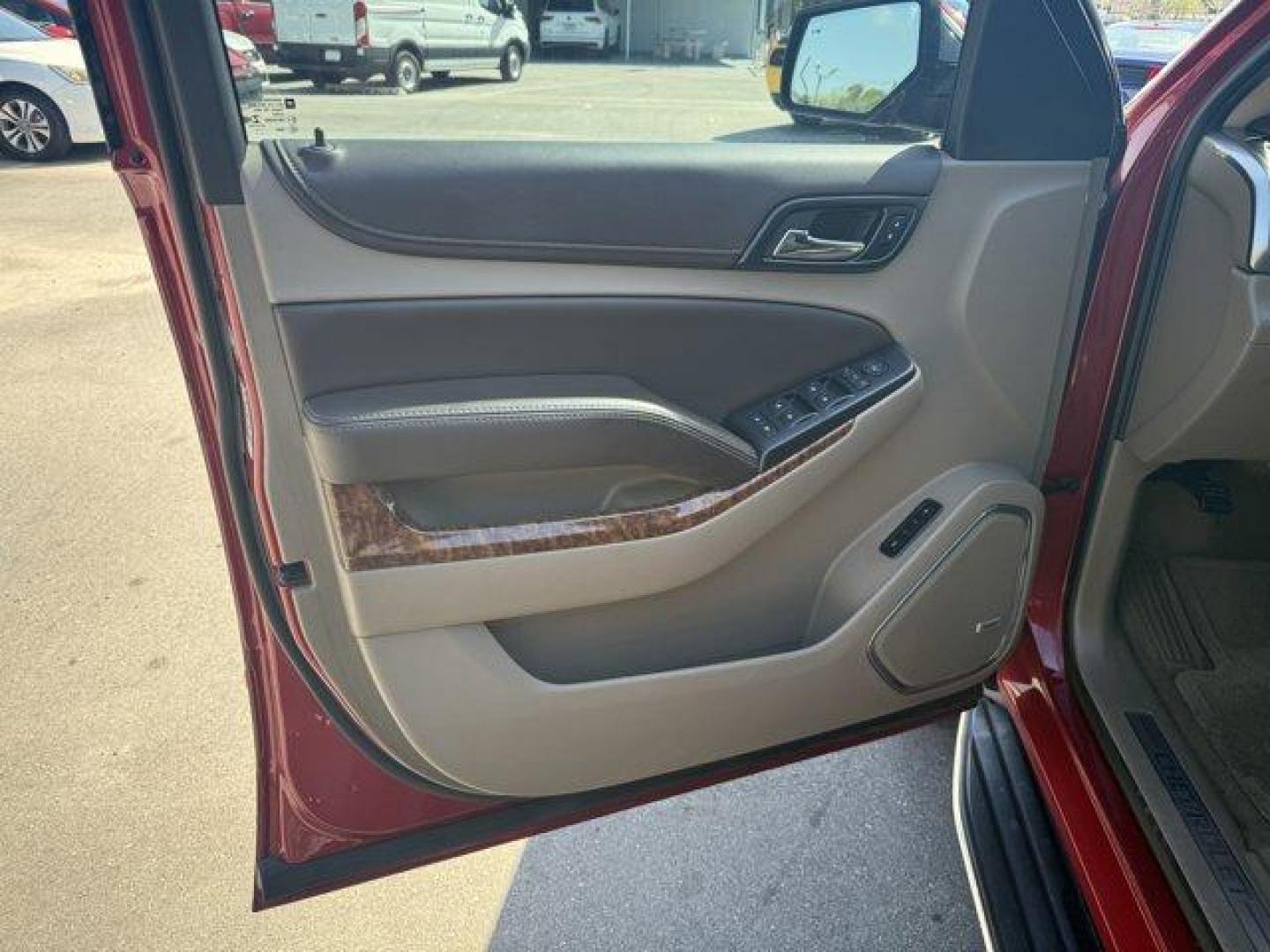 2015 Crystal Red Tintcoat /Cocoa/Dune Chevrolet Tahoe (1GNSCCKC8FR) with an 8 5.3L engine, Automatic transmission, located at 27610 S Dixie Hwy, Homestead, FL, 33032, (305) 749-2348, 25.510241, -80.438301 - KBB.com 15 Best Family Cars. Boasts 23 Highway MPG and 16 City MPG! This Chevrolet Tahoe boasts a Gas/Ethanol V8 5.3L/ engine powering this Automatic transmission. WHEELS, 22 (55.9 CM) PREMIUM PAINTED with chrome inserts, TRANSMISSION, 6-SPEED AUTOMATIC, ELECTRONICALLY CONTROLLED with overdrive and - Photo#11