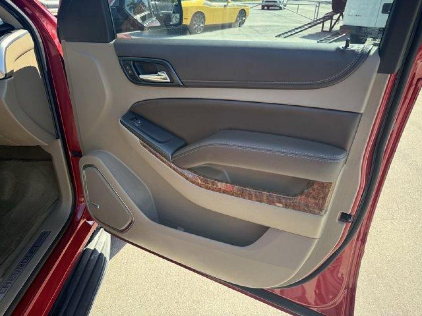 2015 Crystal Red Tintcoat /Cocoa/Dune Chevrolet Tahoe (1GNSCCKC8FR) with an 8 5.3L engine, Automatic transmission, located at 27610 S Dixie Hwy, Homestead, FL, 33032, (305) 749-2348, 25.510241, -80.438301 - KBB.com 15 Best Family Cars. Boasts 23 Highway MPG and 16 City MPG! This Chevrolet Tahoe boasts a Gas/Ethanol V8 5.3L/ engine powering this Automatic transmission. WHEELS, 22 (55.9 CM) PREMIUM PAINTED with chrome inserts, TRANSMISSION, 6-SPEED AUTOMATIC, ELECTRONICALLY CONTROLLED with overdrive and - Photo#16