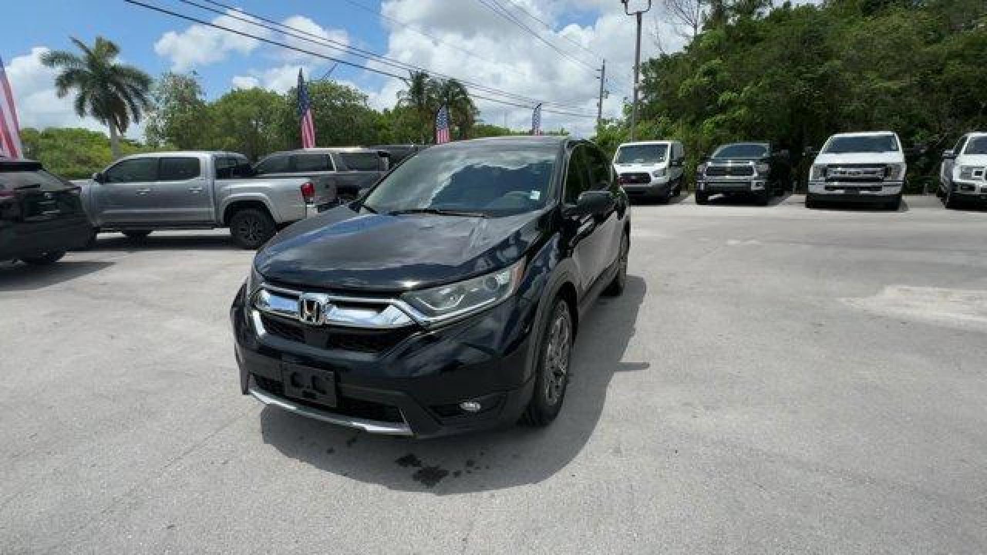 2017 Black Honda CR-V (2HKRW2H51HH) with an 4 1.5 L engine, Variable transmission, located at 27610 S Dixie Hwy, Homestead, FL, 33032, (305) 749-2348, 25.510241, -80.438301 - KBB.com 10 Most Awarded Brands. Scores 33 Highway MPG and 27 City MPG! This Honda CR-V boasts a Intercooled Turbo Regular Unleaded I-4 1.5 L/91 engine powering this Variable transmission. Wheels: 18 Alloy, Valet Function, Urethane Gear Shifter Material.* This Honda CR-V Features the Following Option - Photo#0
