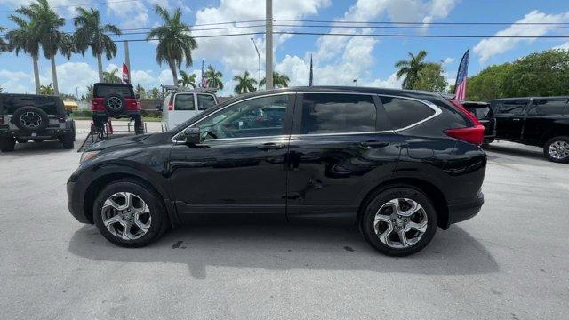 2017 Black Honda CR-V (2HKRW2H51HH) with an 4 1.5 L engine, Variable transmission, located at 27610 S Dixie Hwy, Homestead, FL, 33032, (305) 749-2348, 25.510241, -80.438301 - KBB.com 10 Most Awarded Brands. Scores 33 Highway MPG and 27 City MPG! This Honda CR-V boasts a Intercooled Turbo Regular Unleaded I-4 1.5 L/91 engine powering this Variable transmission. Wheels: 18 Alloy, Valet Function, Urethane Gear Shifter Material.* This Honda CR-V Features the Following Option - Photo#1